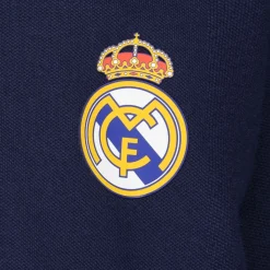 OSDM Vuelta Al Cole|Polos*Polo Niños ECO Essentials Real Madrid Escudo Color Azul
